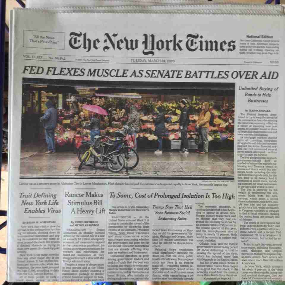 New York Times newspaper front page above the fold on March 24th, 2020 with main headline: FED FLEXES MUSCLE AS SENATE BATTLES OVER AID