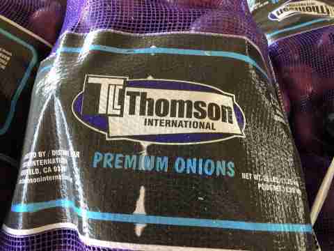 “Product label, TLC Thomson International 25 LBS mesh sack”